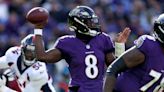 Lamar Jackson exits Ravens' win with knee injury, is 'days to weeks' per John Harbaugh