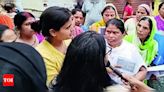 Women protest against survey in Kukrail floodplain area | Lucknow News - Times of India