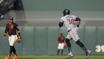 Carlos Santana homers to break 6th-inning tie, the Twins beat the Giants 4-2