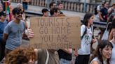 Spain holiday companies suggest boycott over 'tourists go home' protests