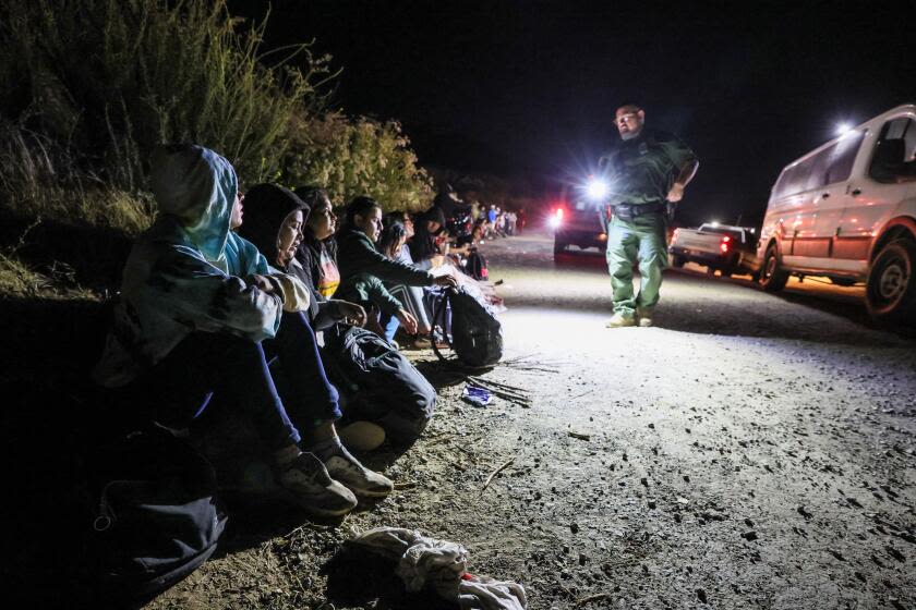Photos: A visual report from the border following President Biden's rollout of asylum restrictions