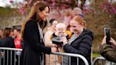 Kate Middleton Lets a Baby Play with Her Handbag in Wales: 'I'll Come Back for It!'