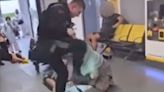 Police officer filmed stomping on man's head