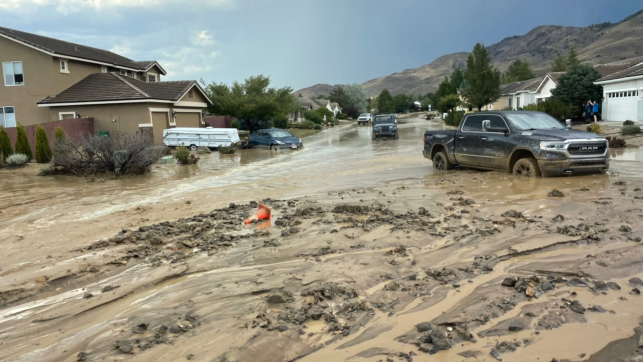 Family displaced in Hidden Valley after flash flood; more storms possible