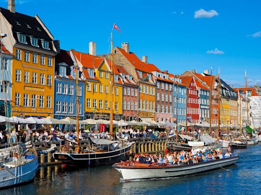 Copenhagen may have cracked how to get tourists to behave: Free glasses of wine and kayaking