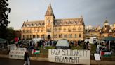 With bright tents and sombre mood, protesting UK students show solidarity with US peers