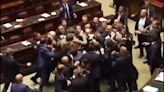 Fight breaks out in Italy's Chamber of Deputies during controversial vote