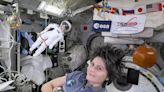 Space station's Italian commander, with lookalike Barbie, tells girls about science in orbit