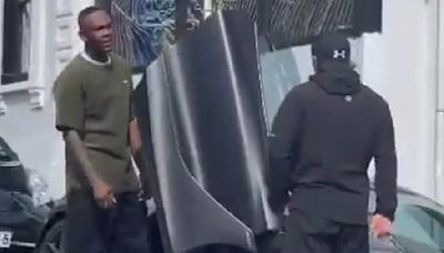 UFC superstar Israel Adesanya appears to SPIT at driver