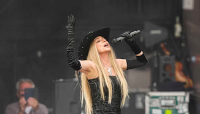 AP Photos: Music fans attend the Glastonbury Festival in England