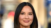 Olivia Munn is going through medically induced menopause after breast cancer treatment. Here's what that means.