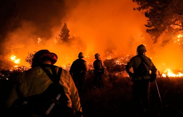 California, Nevada and Oregon wildfires force thousands to evacuate and burn hundreds of thousands of acres