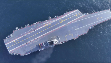 China flexes new aircraft carrier muscles