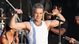 Headliner Robbie Williams' dancer grabs his bottom at BST Hyde Park