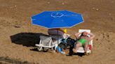 Heatwaves ‘likely to hit UK’ after drizzly spring – but it will not last