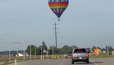 WATCH: Hot-air balloon hits power lines in Indiana, three injured
