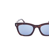 Introduced in the 1950s, wayfarer sunglasses have a distinctive trapezoidal shape and thick plastic frames. They are popular for their retro and edgy look, and are often associated with the rock and roll culture. They are suitable for most face shapes and are available in a variety of frame and lens colors.
