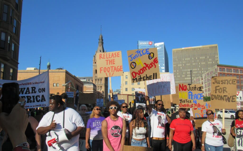 Families of Sam Sharpe and Dvontaye Mitchell rally in Red Arrow Park