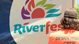 Signs of Riverfest going up in downtown Wichita