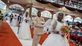 More than 800 couples walk down the aisle on Easter Sunday in mass wedding