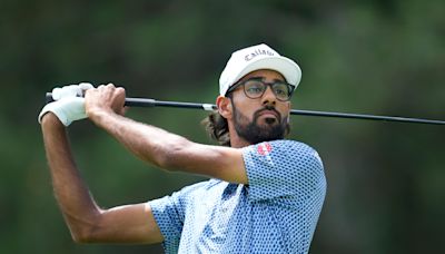 Akshay Bhatia shoots 64 in Detroit to take 1st-round lead at Rocket Mortgage Classic