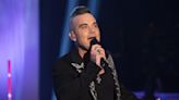 Robbie Williams poses naked for new album as he jokes about 'computer trickery'