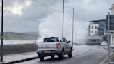 Beach huts washed into sea as storm sweeps in