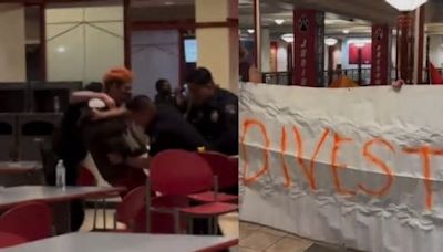 Police break through barricade at University of New Mexico encampment, haul away activists