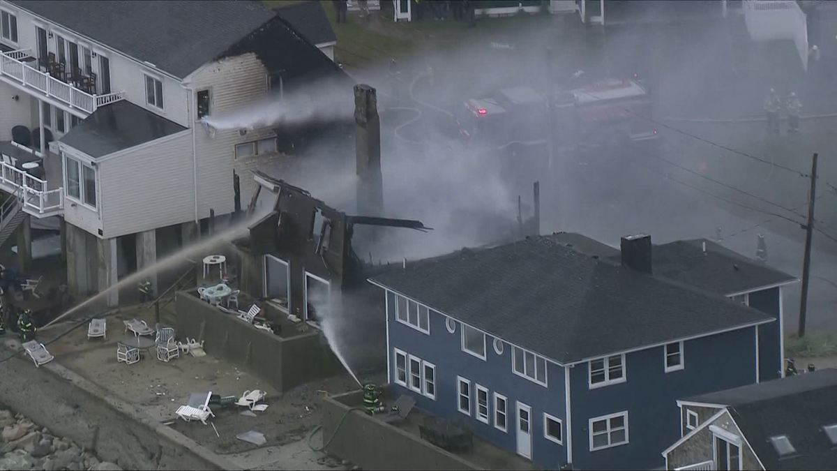 Fire destroys oceanfront home along Mass. coast, damages 2 others