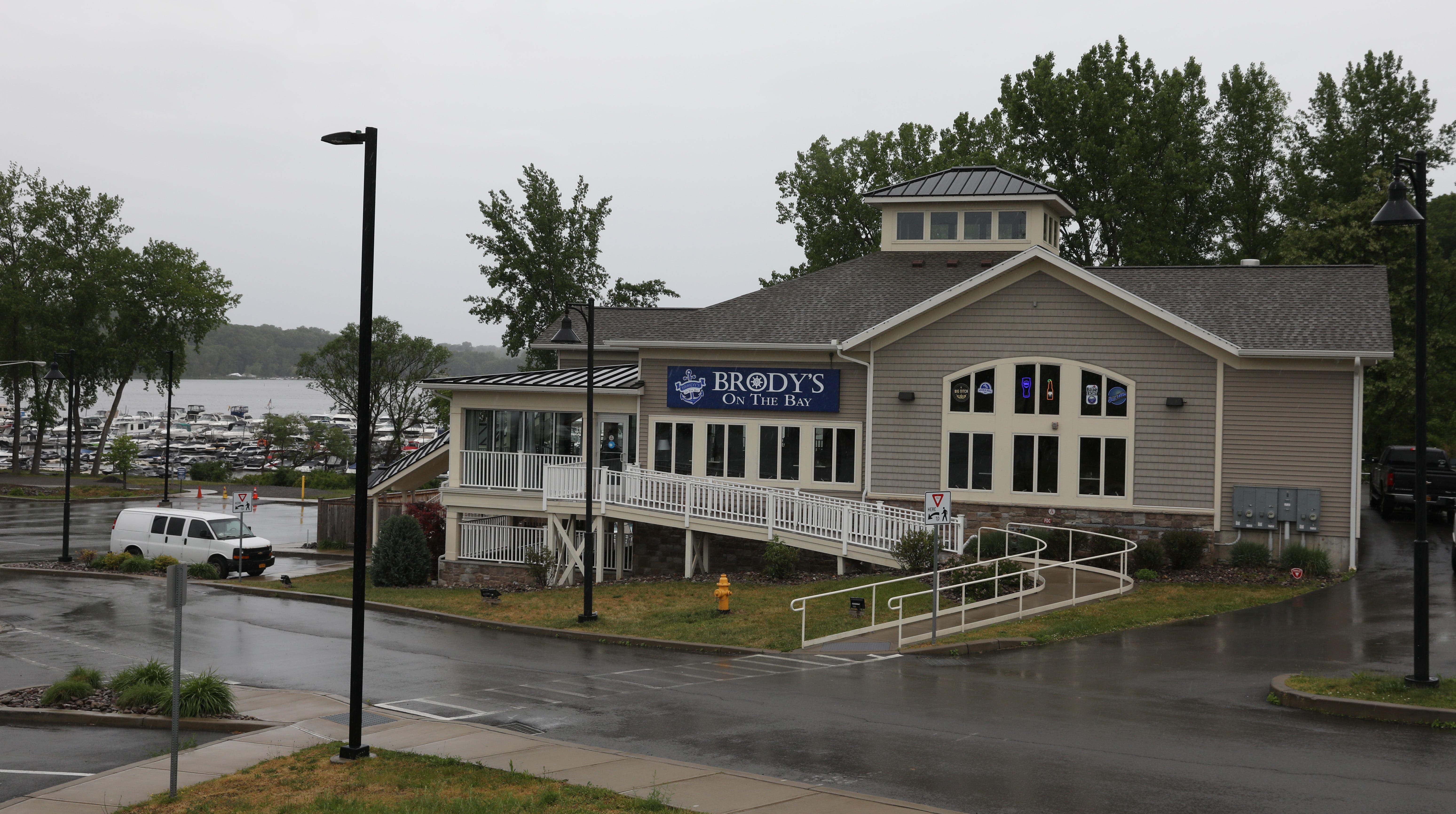 Waterfront restaurant with views of Irondequoit Bay closing