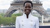 Lupita Nyong’o Accessorizes a Chanel Suit Jacket With a Shimmery Cat Purse
