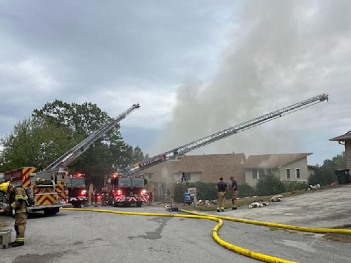 CFD crews working to keep grass fire from spreading to Hixson home Thursday morning