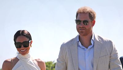 Prince Harry's reaction to Meghan kissing teammate goes viral