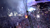 1 firefighter killed, over a dozen other people injured in house explosion