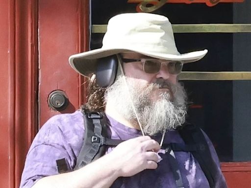 Jack Black looks unrecognizable with bushy beard and wide-brim hat