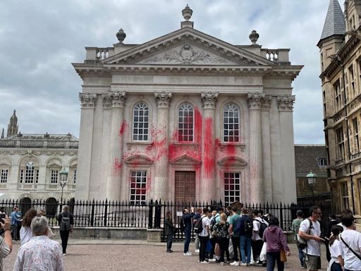 Pro-Palestinian protesters spray red paint on Cambridge graduation building