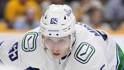 Canucks trade 2 players, 2nd-round pick to clear cap space