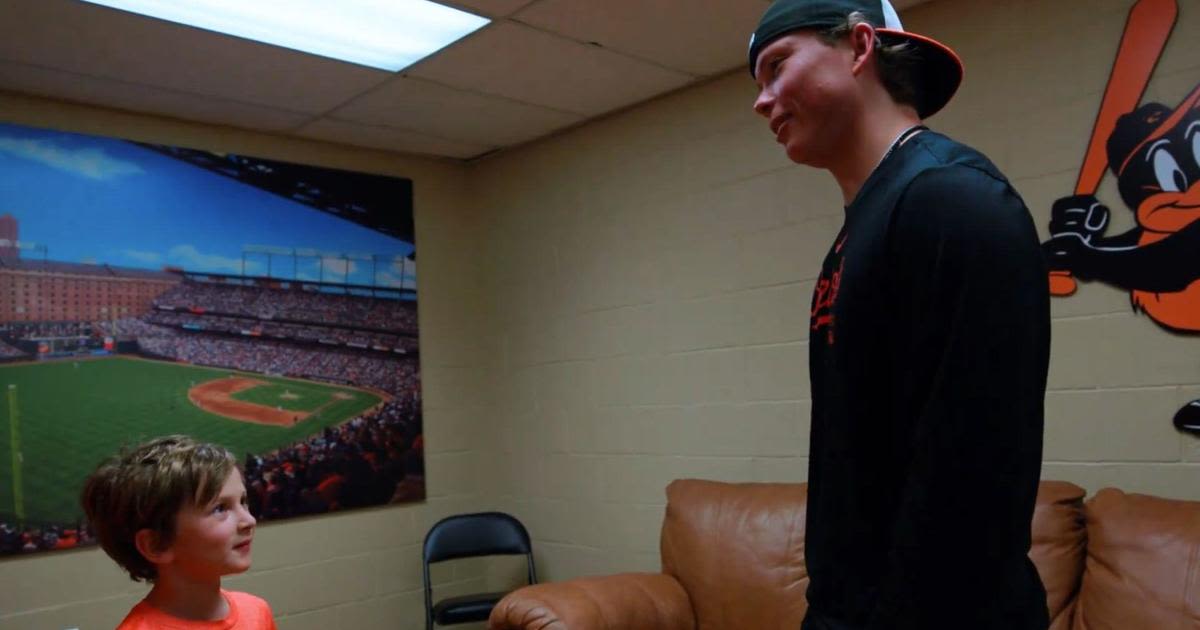 Baltimore Orioles' Jackson Holliday retrieves first home run ball from young fan