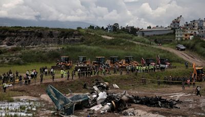 18 people killed, pilot sole survivor after plane skids off runway and crashes in Nepal