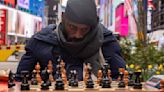 Nigerian chess champion Tunde Onakoya plays for 60 hours in Times Square, breaking marathon record