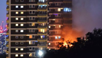 Five people taken to hospital after fire at high-rise flats in east London