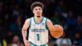 Hornets' LaMelo Ball helped off court not to return after frightening right ankle injury
