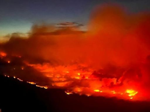 Rapidly-spreading fires are threatening to burn through Canadian towns and degrading air quality