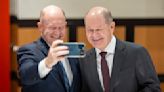 US Sen. Coons and German Chancellor Scholz see double at Washington meeting