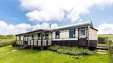 The incredible transformation of an old railway carriage perched on top of a Welsh cliff