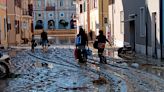 Floods in Italy kill 10; Survivors plucked from roofs, trees