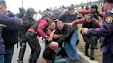Security official in Argentina punched, kicked at protest