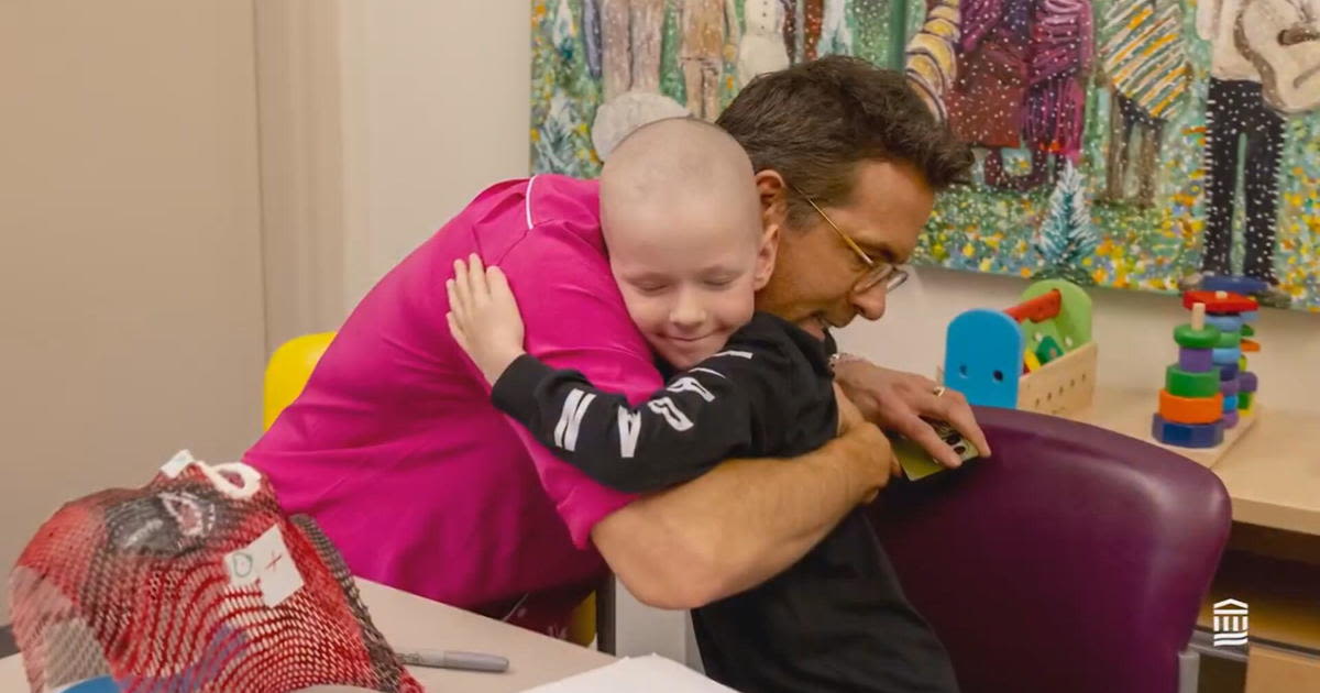 Ryan Reynolds surprises young cancer patient at Boston hospital