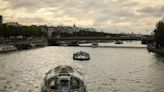 Boats cruise the Seine river in a rehearsal for the Paris Olympics’ opening ceremony