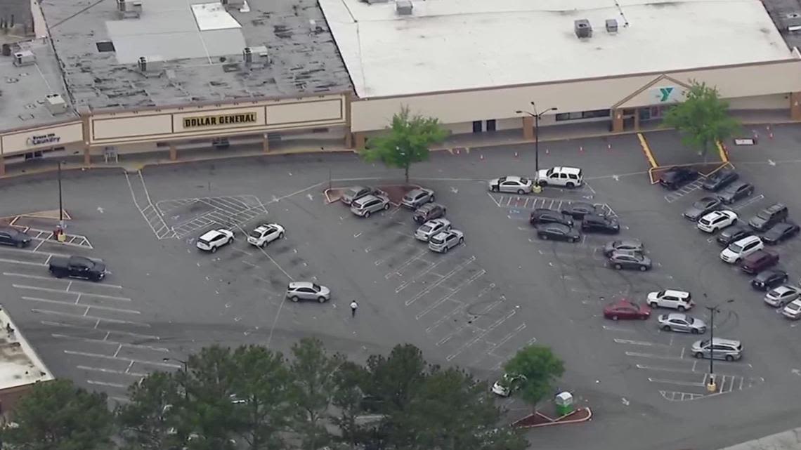 Alleged robbery suspect critically injured after shooting with authorities at DeKalb County shopping center, police say